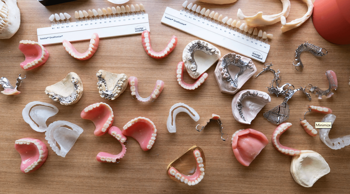 different shapes, sizes and styles of new dentures